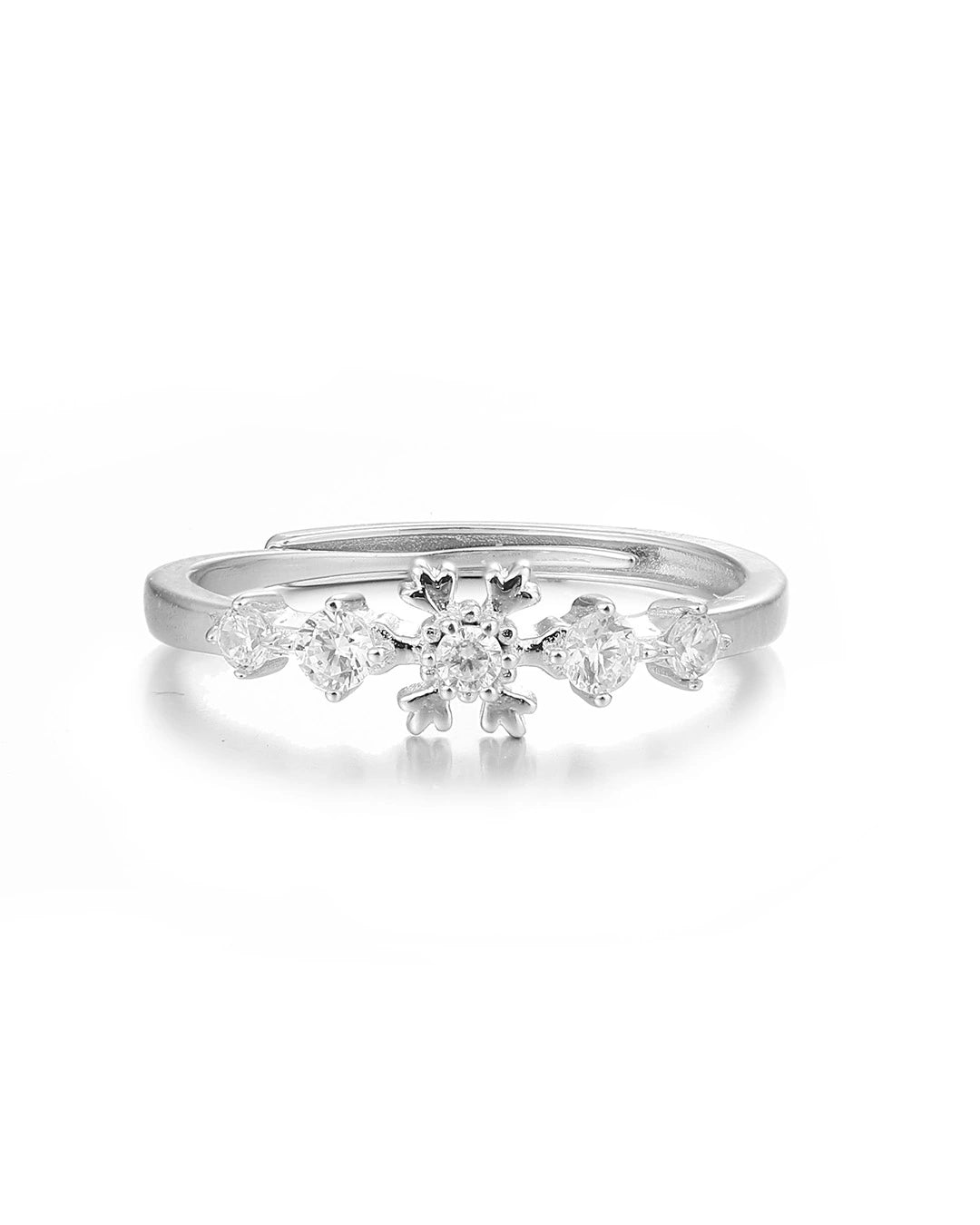 Silver ring with diamond accents on a white background