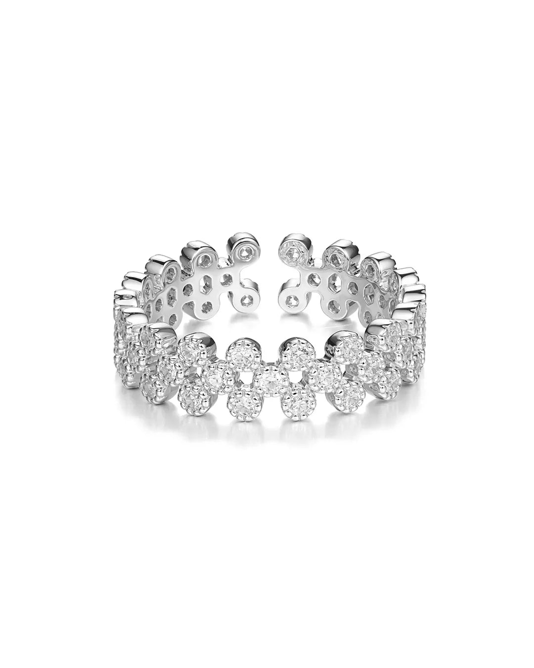 Silver ring with floral design on a white background