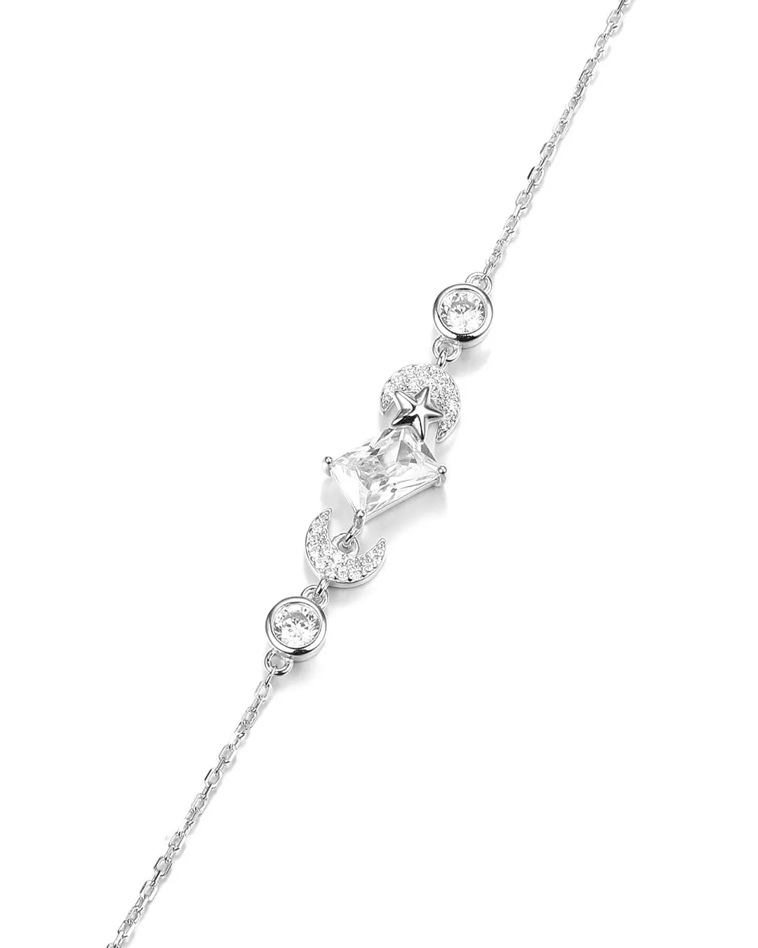 Silver necklace with diamond-like stones on a white background