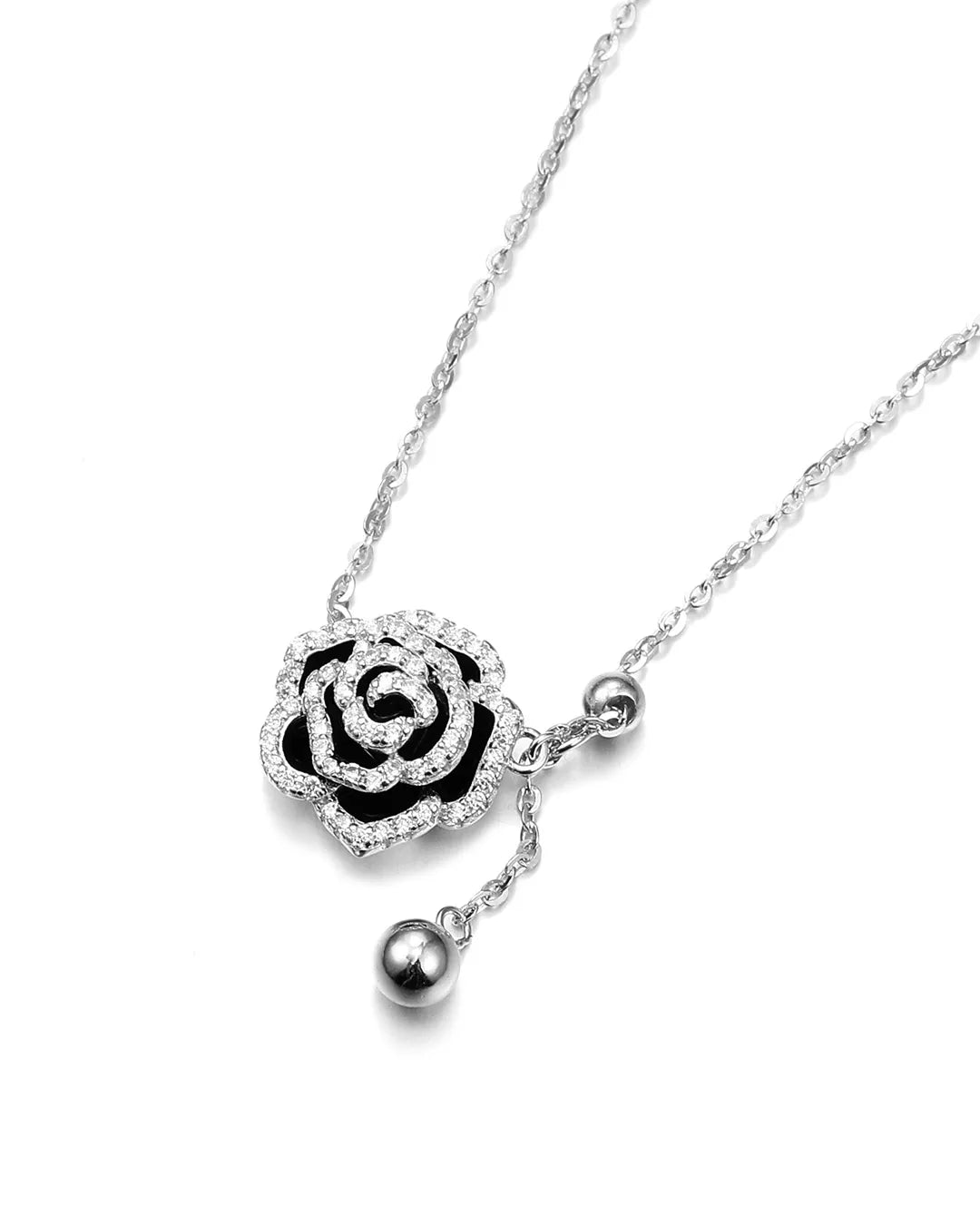 Silver necklace with a rose-shaped pendant on a white background