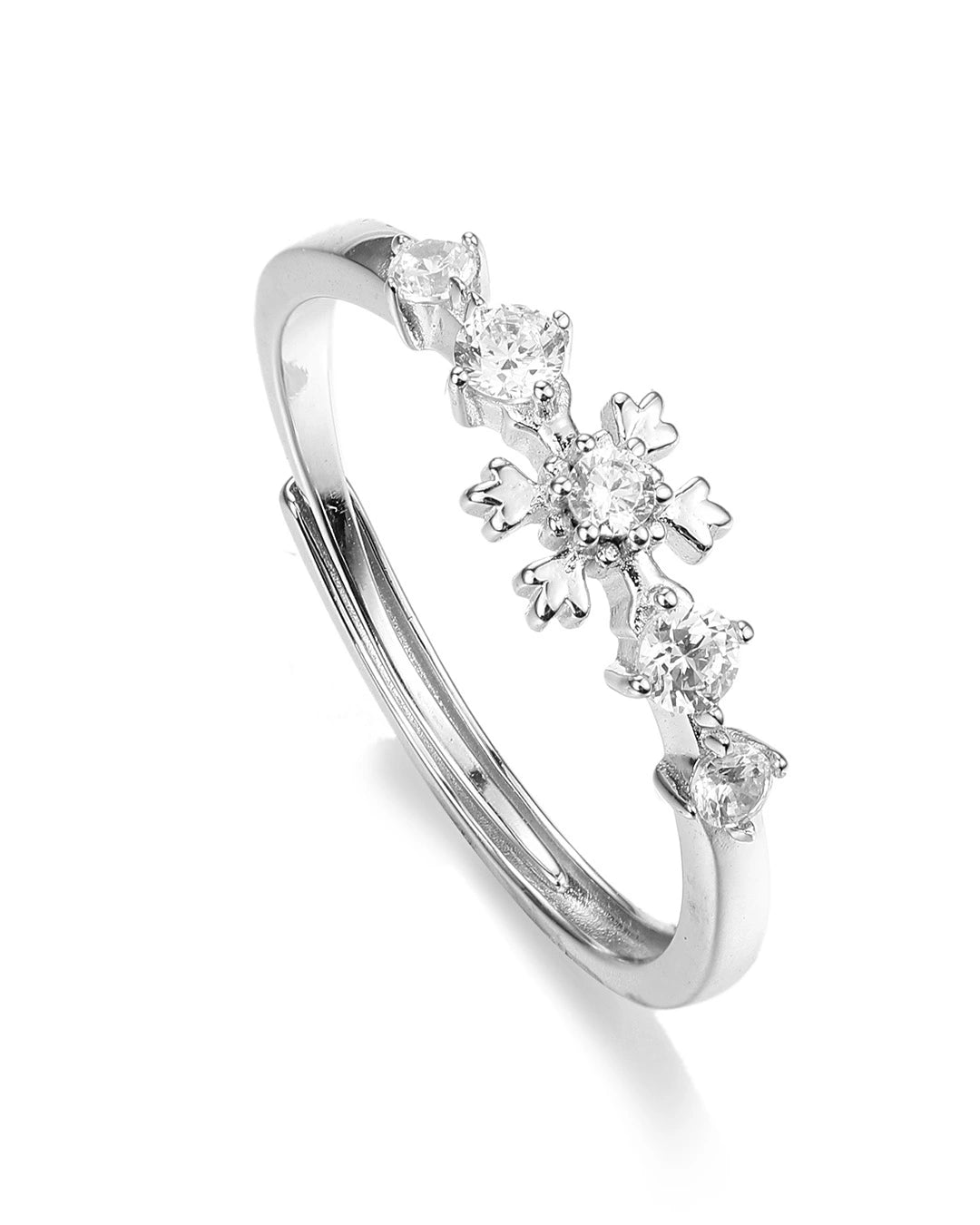 Silver ring with diamond accents on a white background