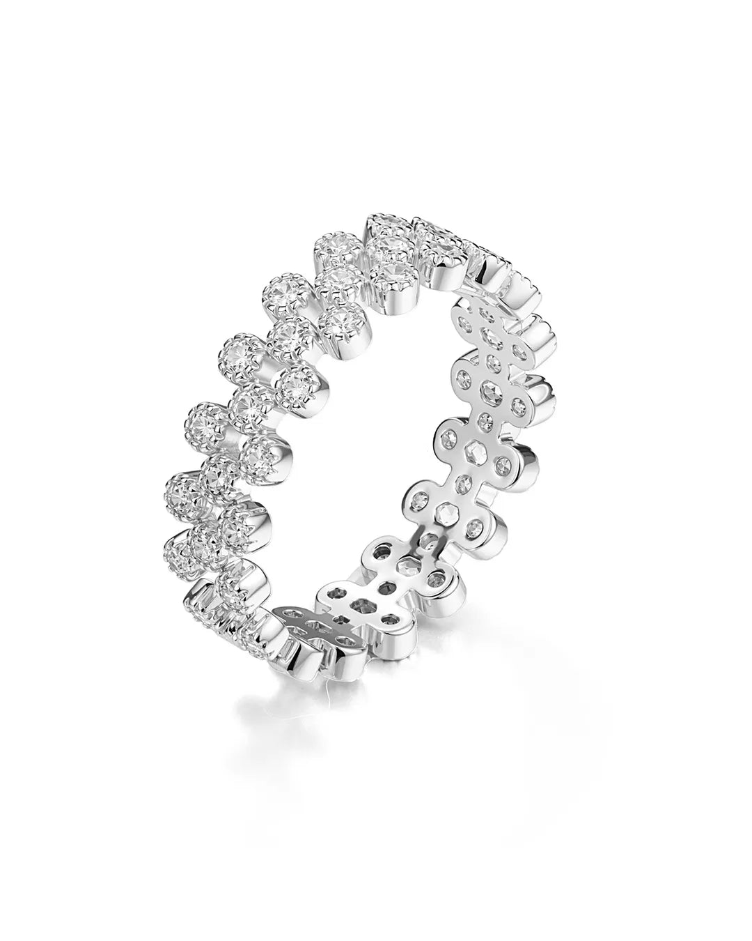 Silver ring with clear gemstones on a white background