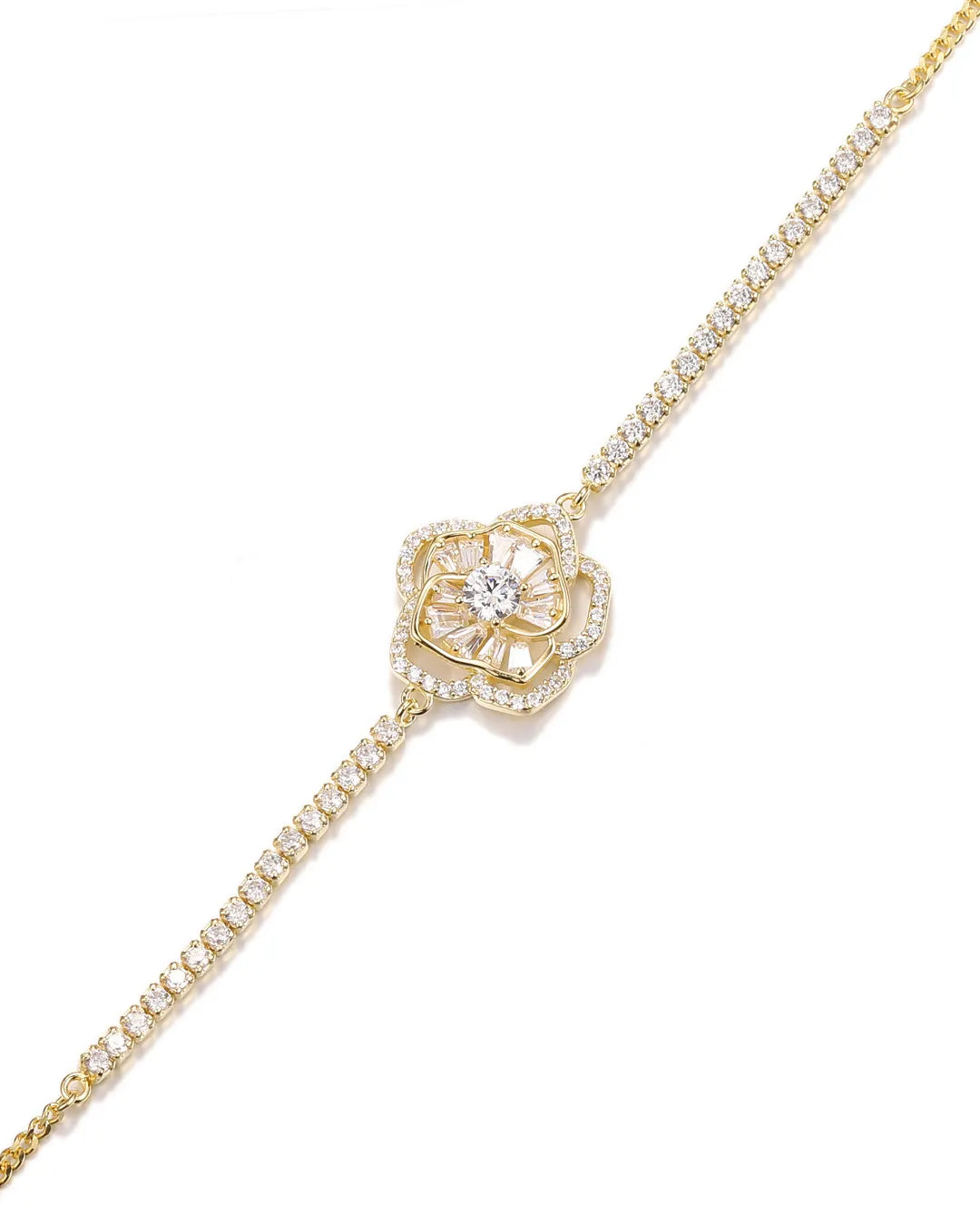 Gold bracelet with diamond accents on a white background