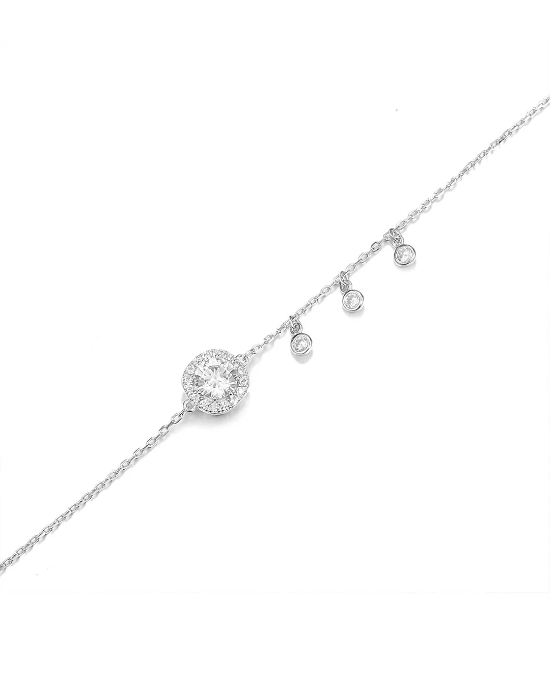 Silver necklace with a round pendant and smaller beads on a white background