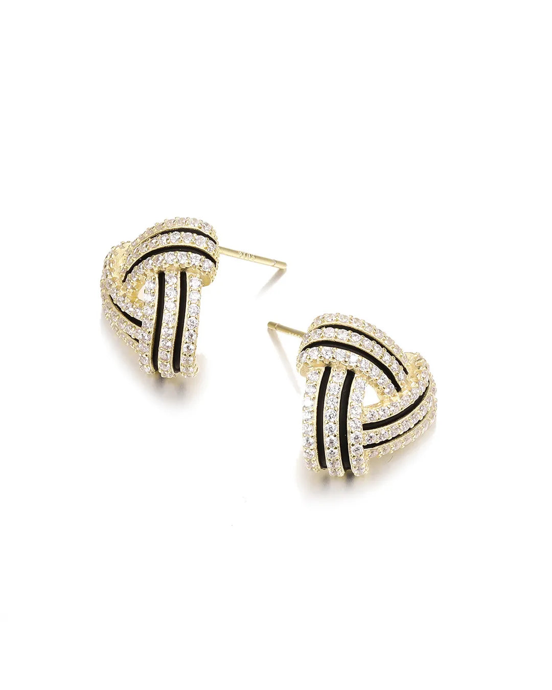Pair of gold and black earrings on a white background