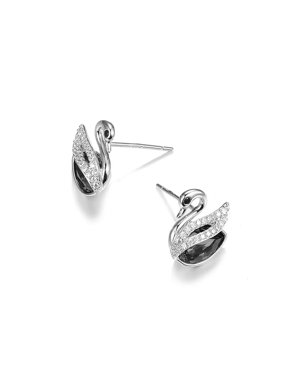 Silver swan-shaped earrings with clear stones on a white background