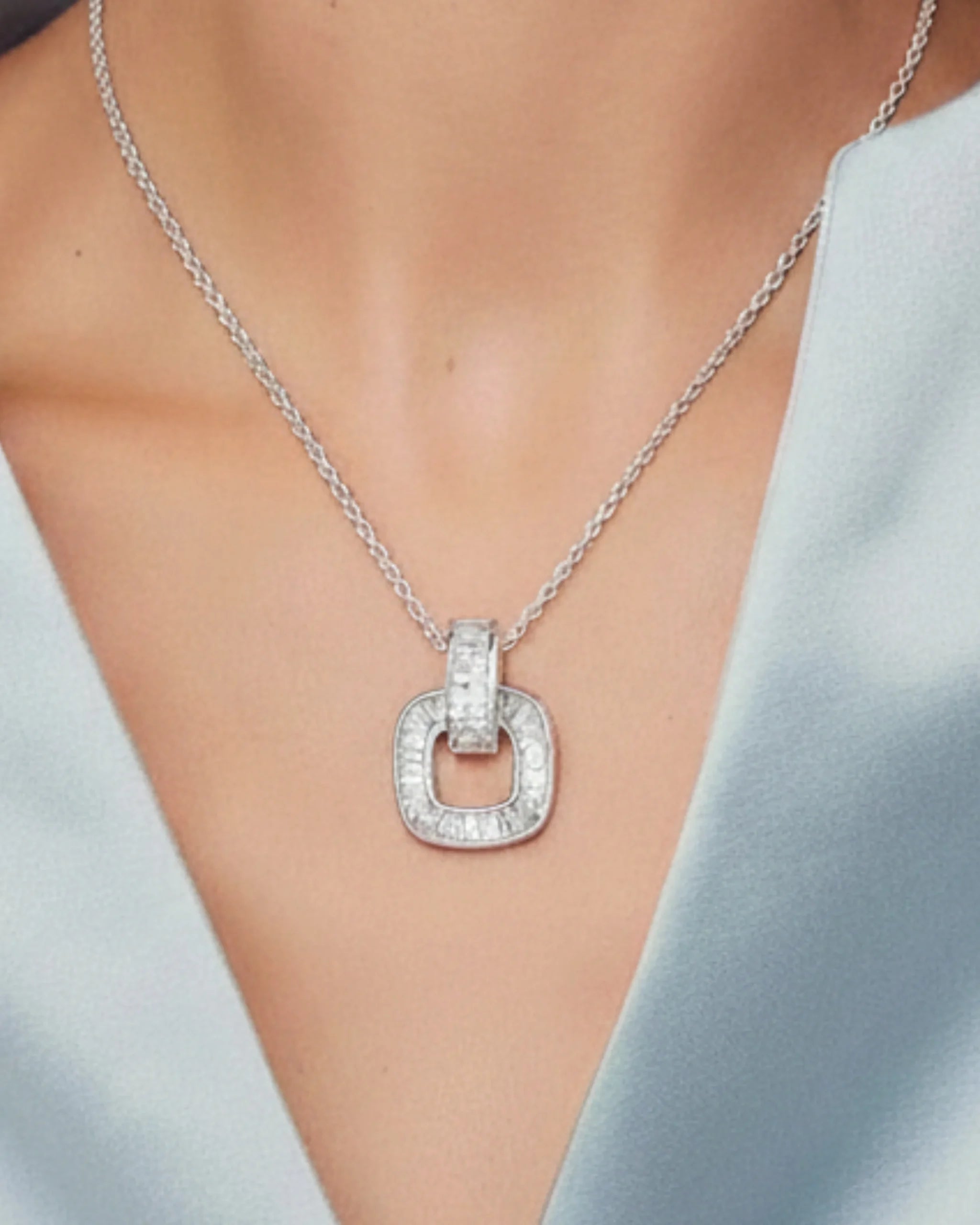 Versatile Silver Pendant Necklace with a Polished Geometric Design