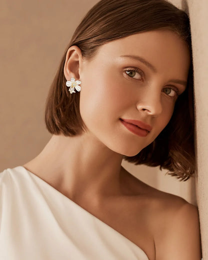 Delicate Flower Gold Stud Earrings for a Feminine and Elegant Look