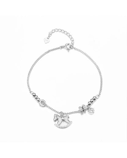 Silver bracelet with horse charm on a white background