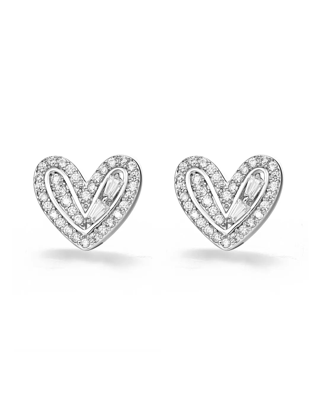 Heart-shaped silver earrings with clear stones on a white background