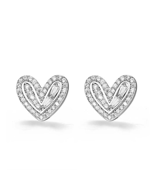 Heart-shaped silver earrings with clear stones on a white background