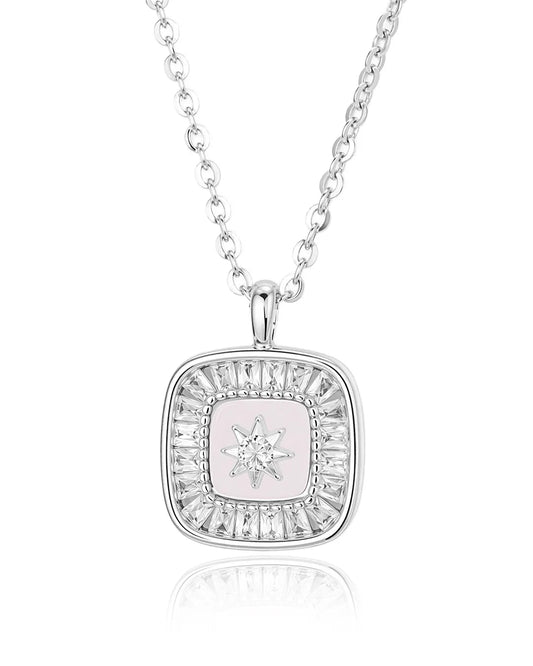 Silver necklace with a square pendant featuring a star design on a white background