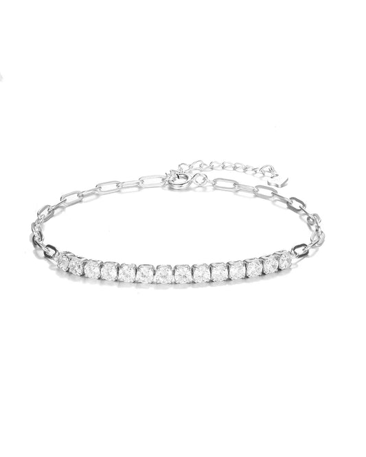 Silver bracelet with clear stones on a white background