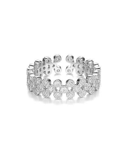 Silver ring with floral design on a white background