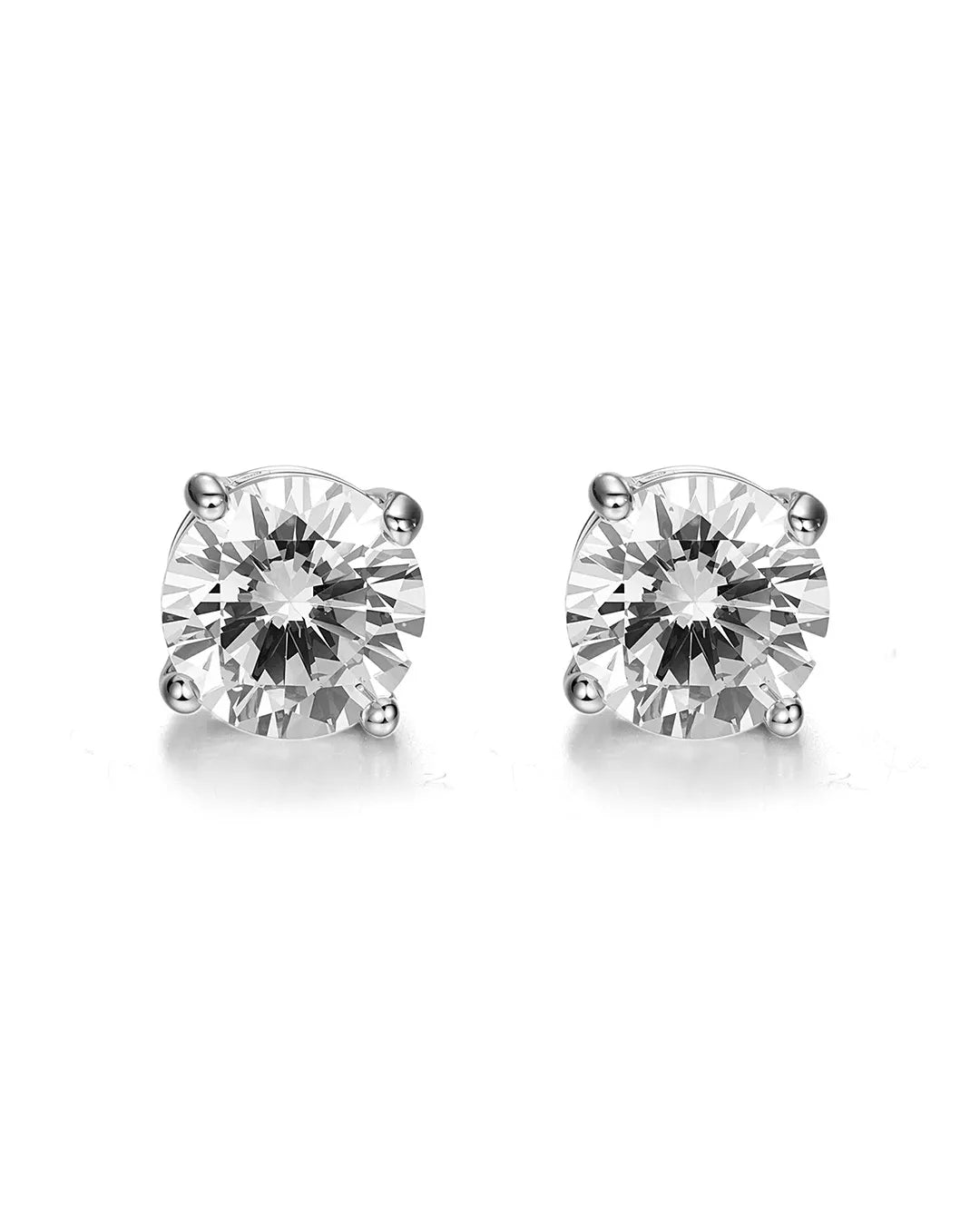 Pair of diamond stud earrings on a white background