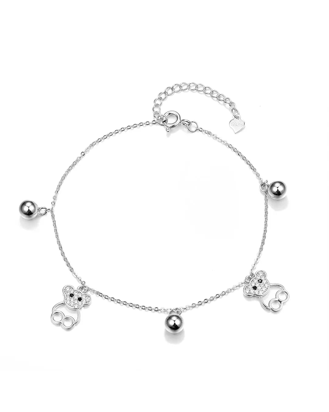 Silver bracelet with charms on a white background
