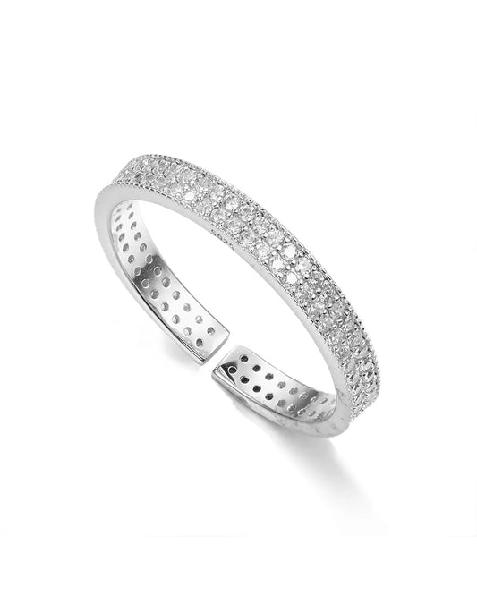 Silver ring with intricate design on a white background