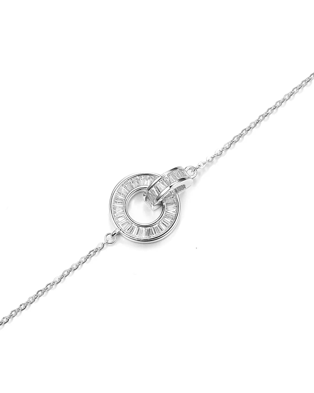 Silver necklace with a circular pendant on a white background