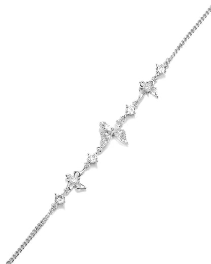 Silver necklace with star-shaped pendants on a white background