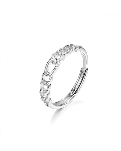 Silver ring with floral design on a white background