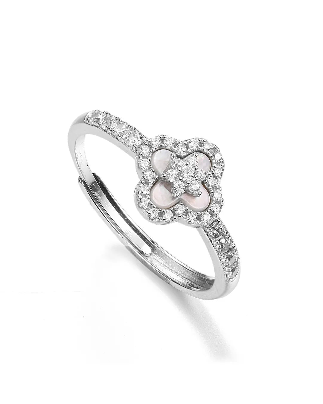 Silver ring with a heart-shaped center and diamond accents on a white background