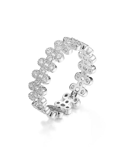 Silver ring with clear gemstones on a white background