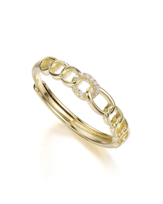 Gold chain-link ring with embedded diamonds on a white background