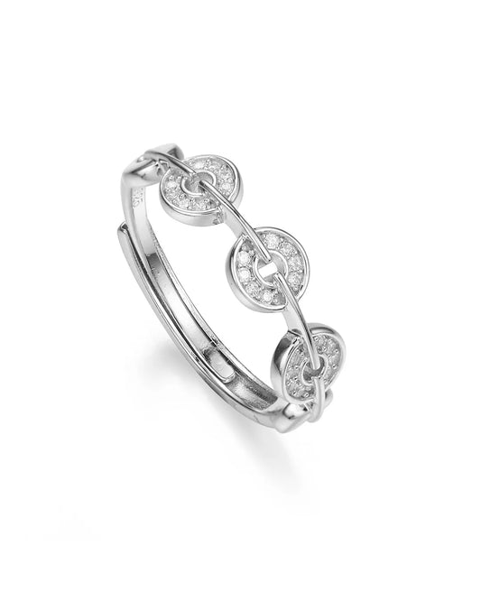 Silver ring with floral design on a white background