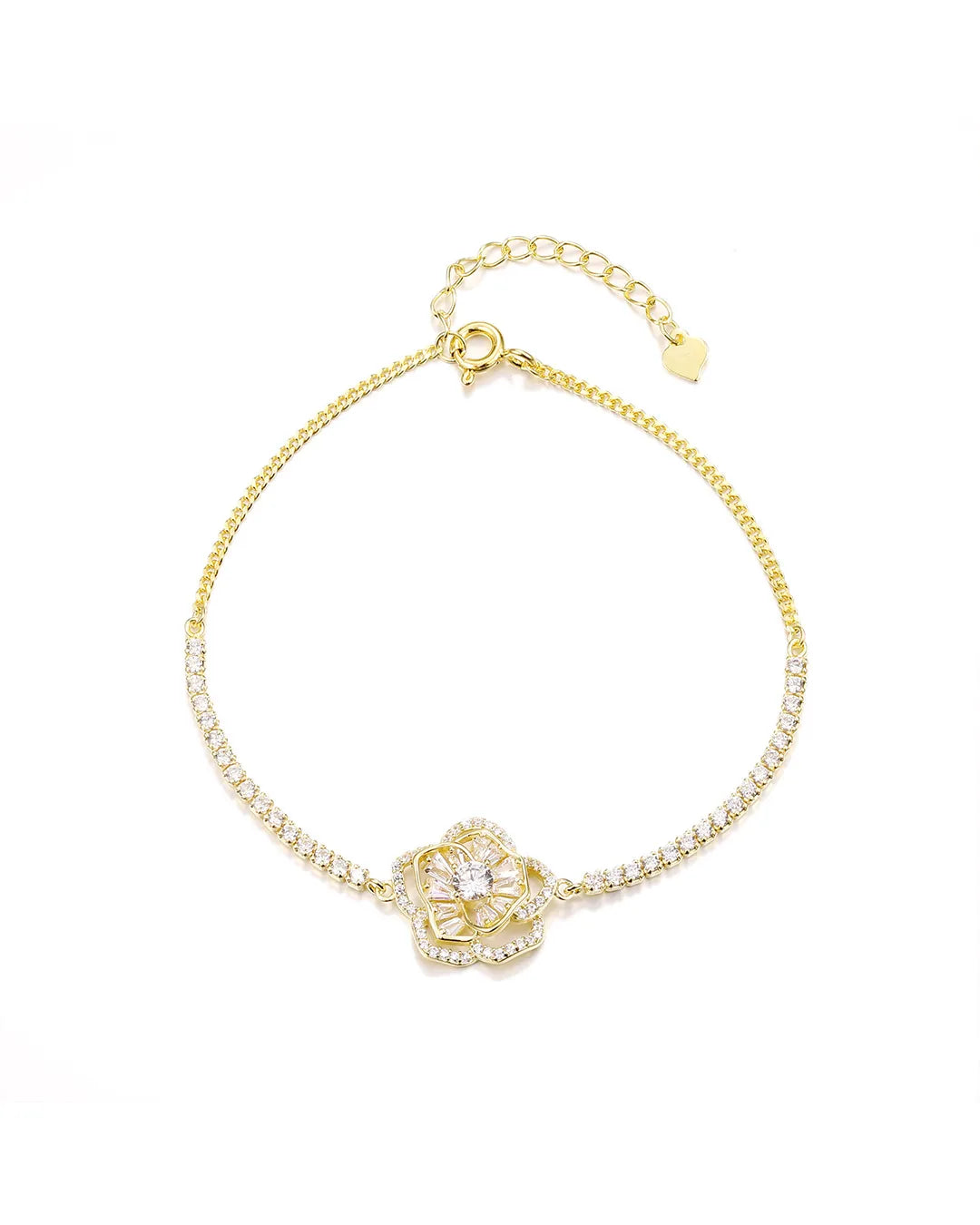 Gold bracelet with a floral clasp on a white background