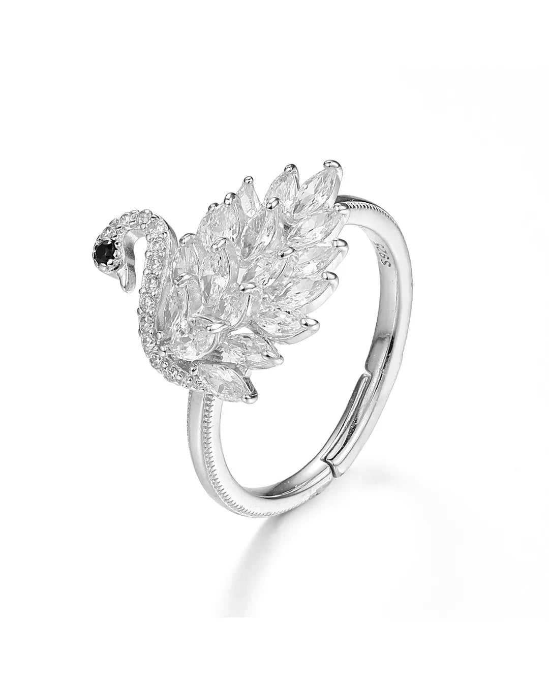 Silver ring with leaf-like design on a white background