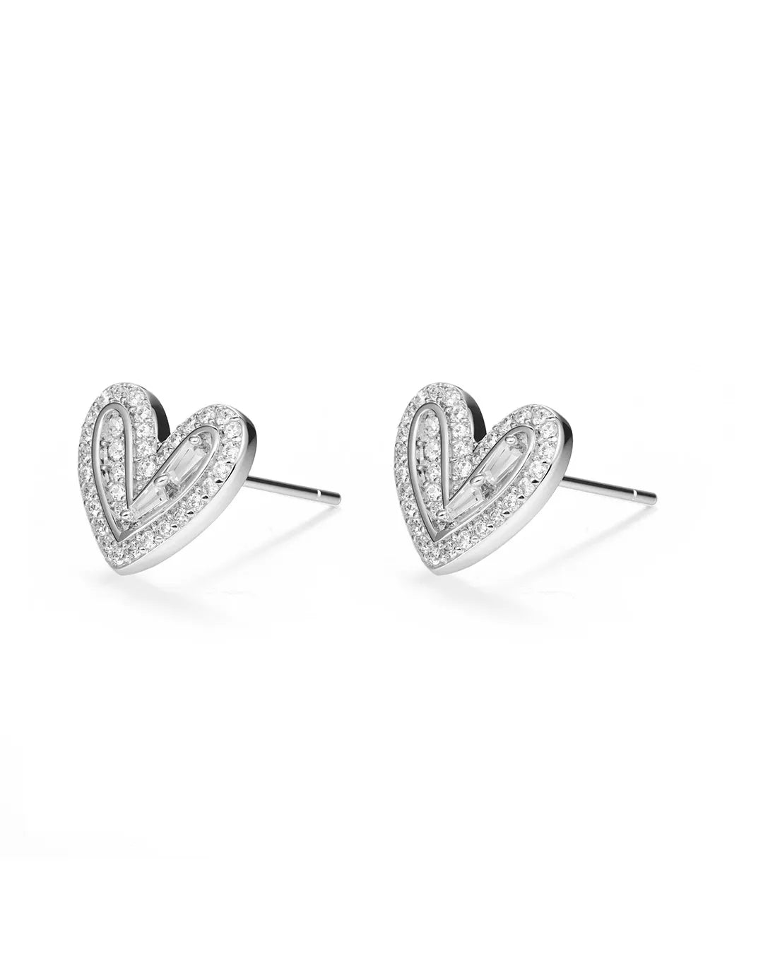 Heart-shaped earrings with diamond accents on a white background