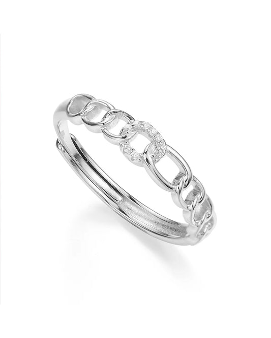 Silver chain-link ring on a white background