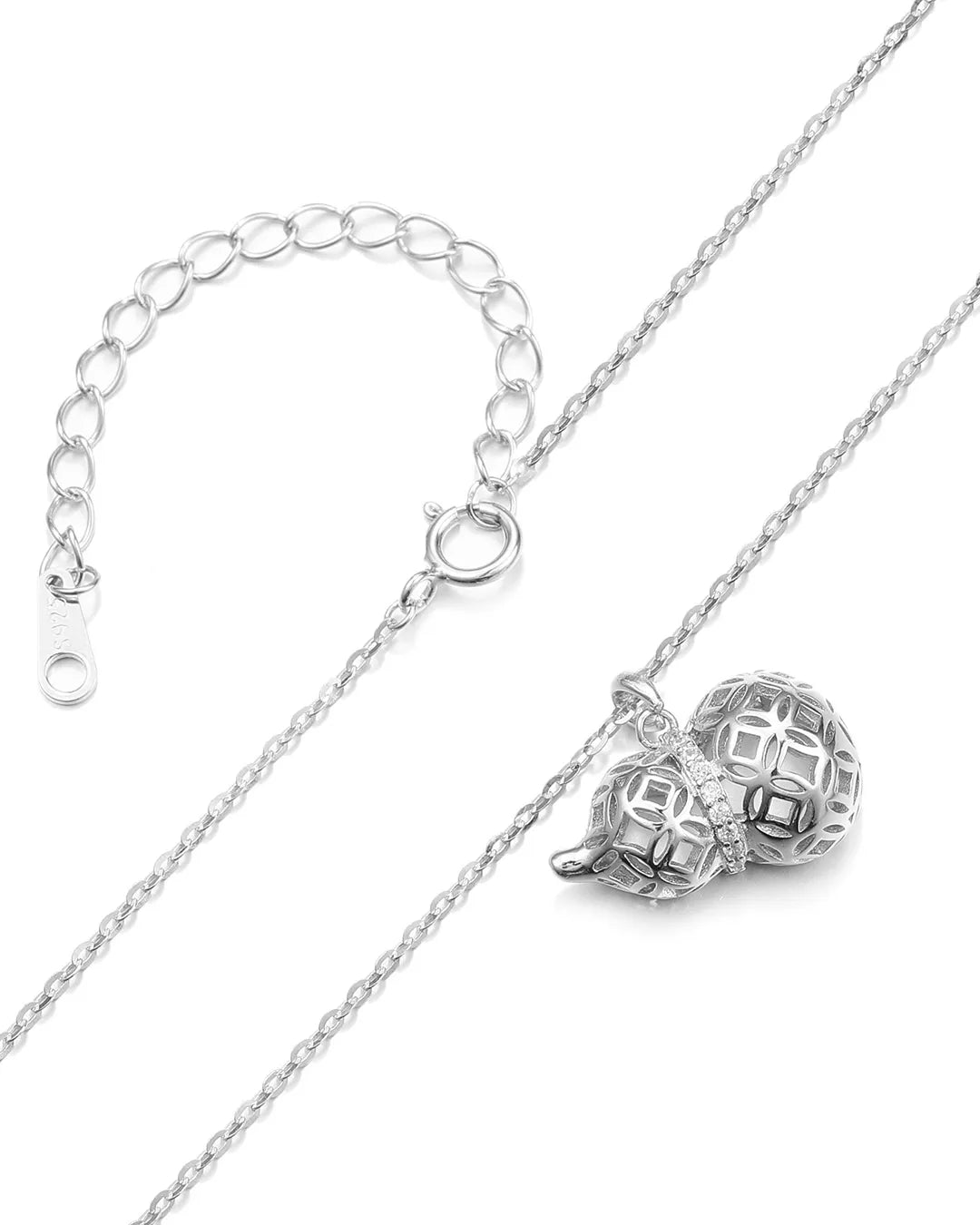 Silver necklace with a unique pendant on a white background