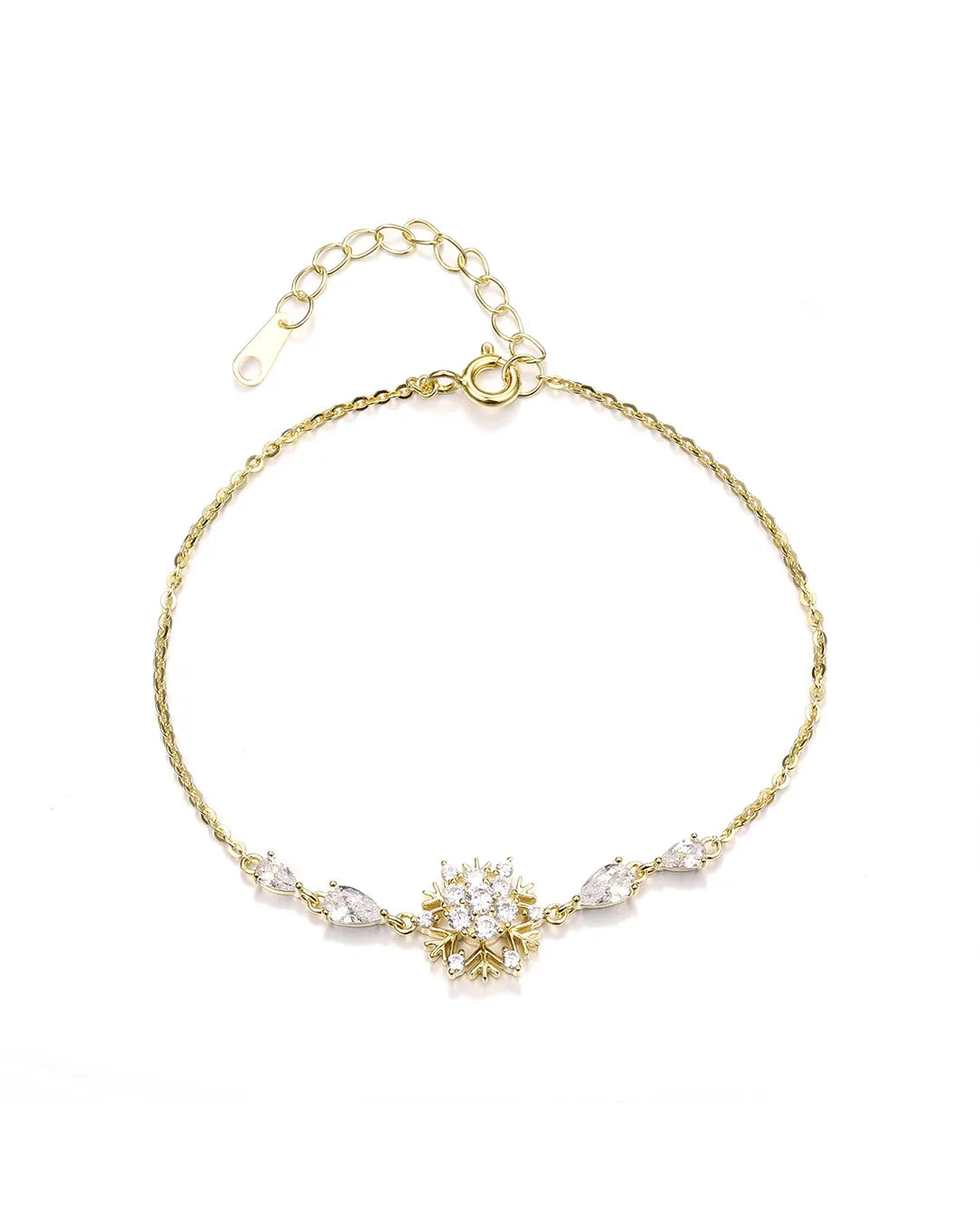 Gold bracelet with floral design and pearls on a white background