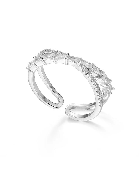 Silver ring with clear gemstones on a white background