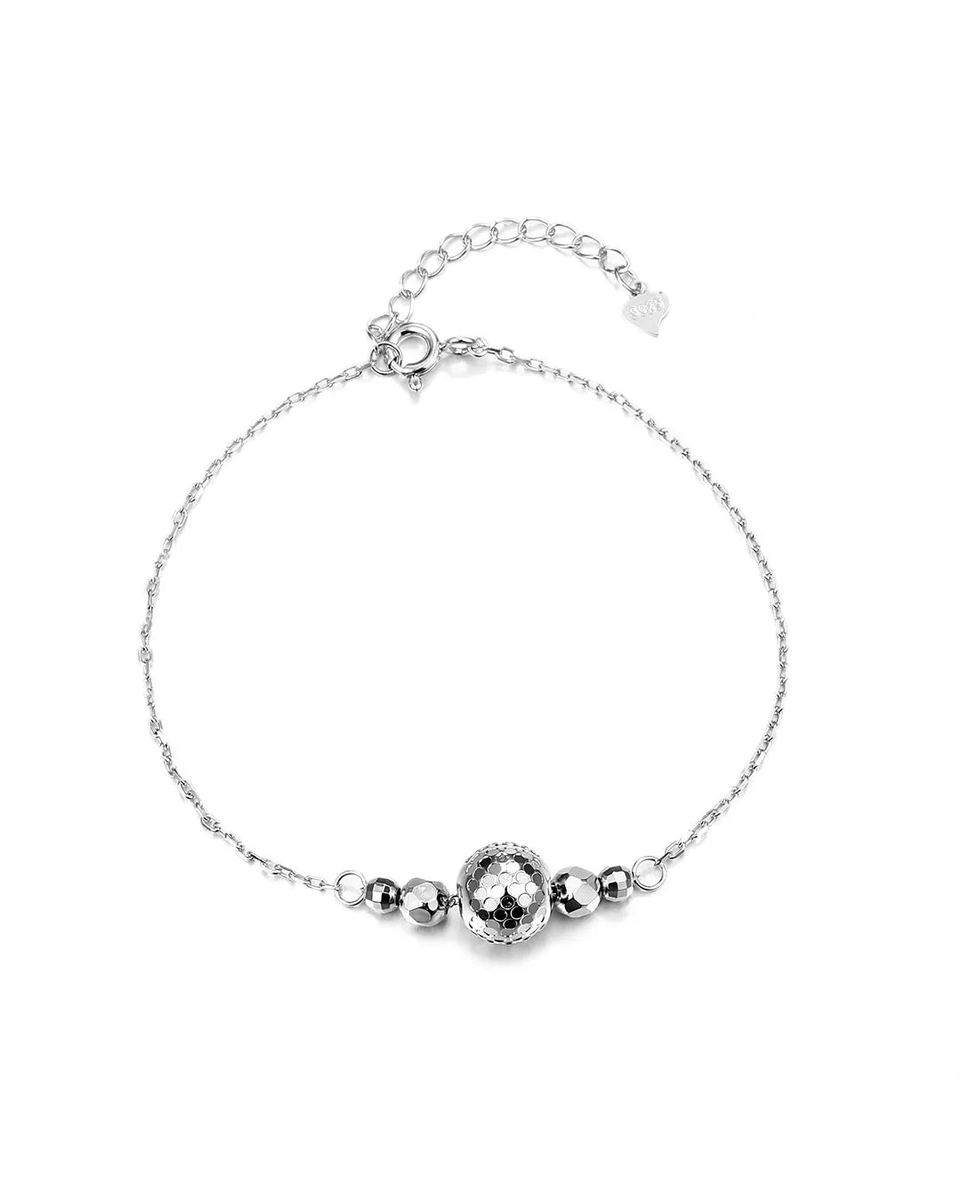 Silver bracelet with three beads on a white background