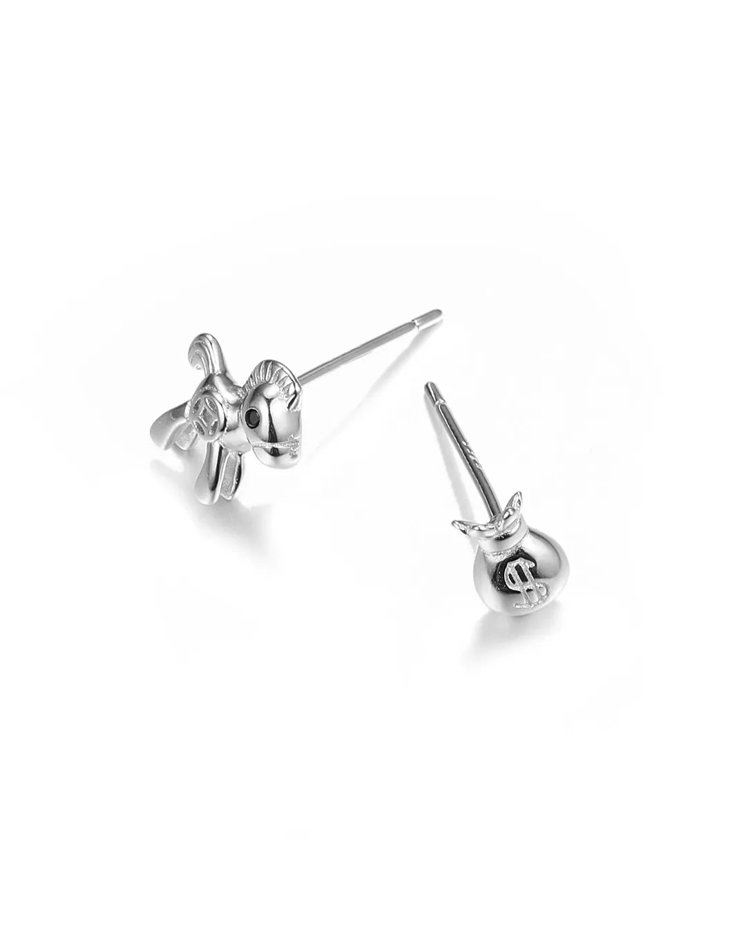 Pair of silver earrings on a white background