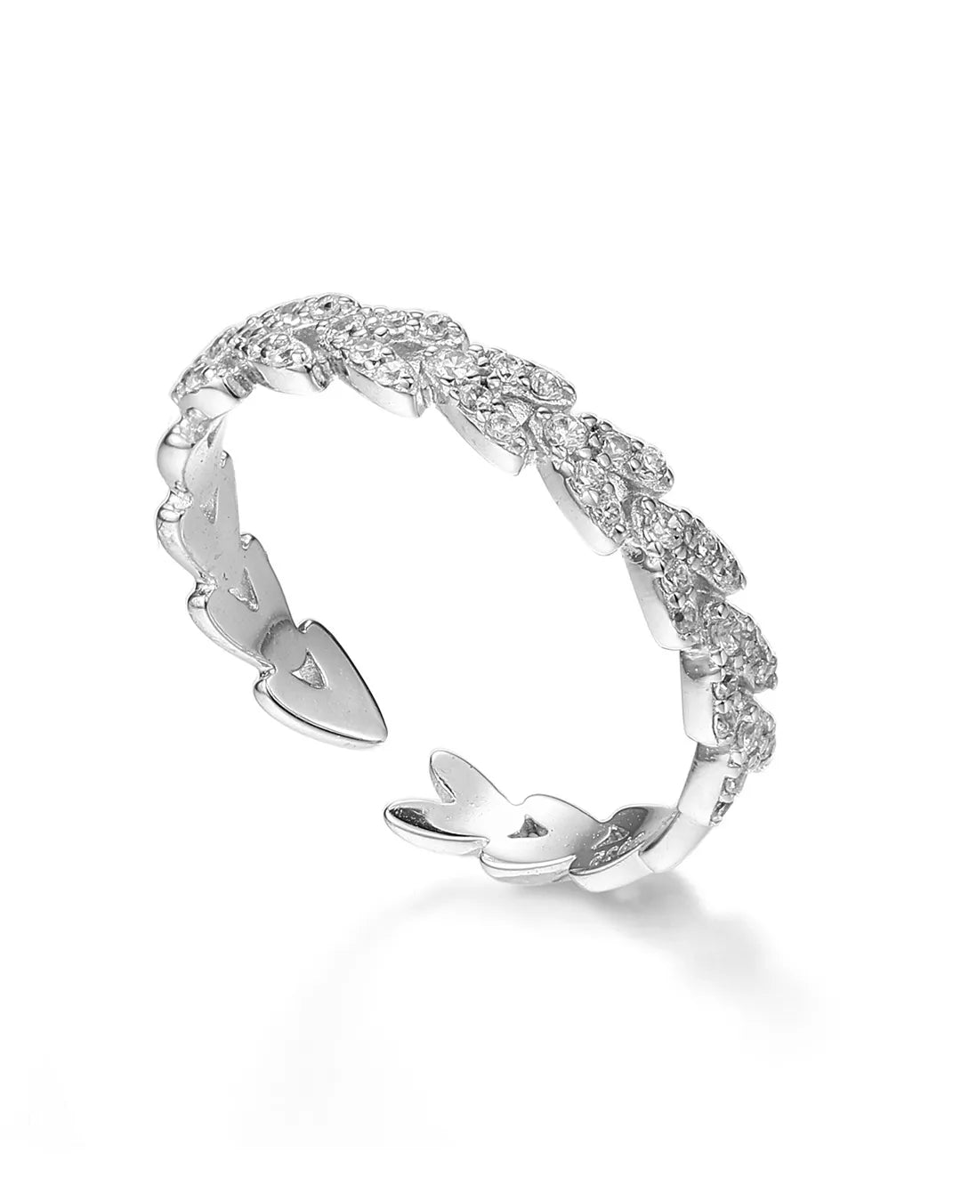 Silver ring with diamond accents on a white background