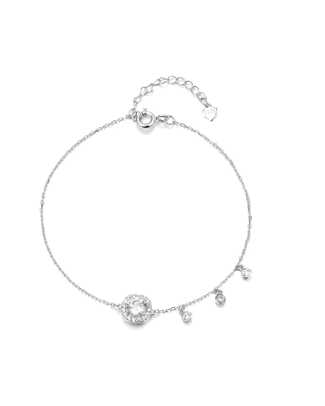 Silver bracelet with small round charm on a white background