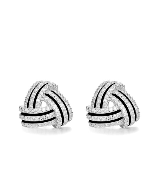 Pair of knot-shaped earrings with black and clear gemstones on a white background